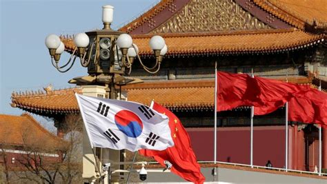 South Korea summons China envoy over warning on .